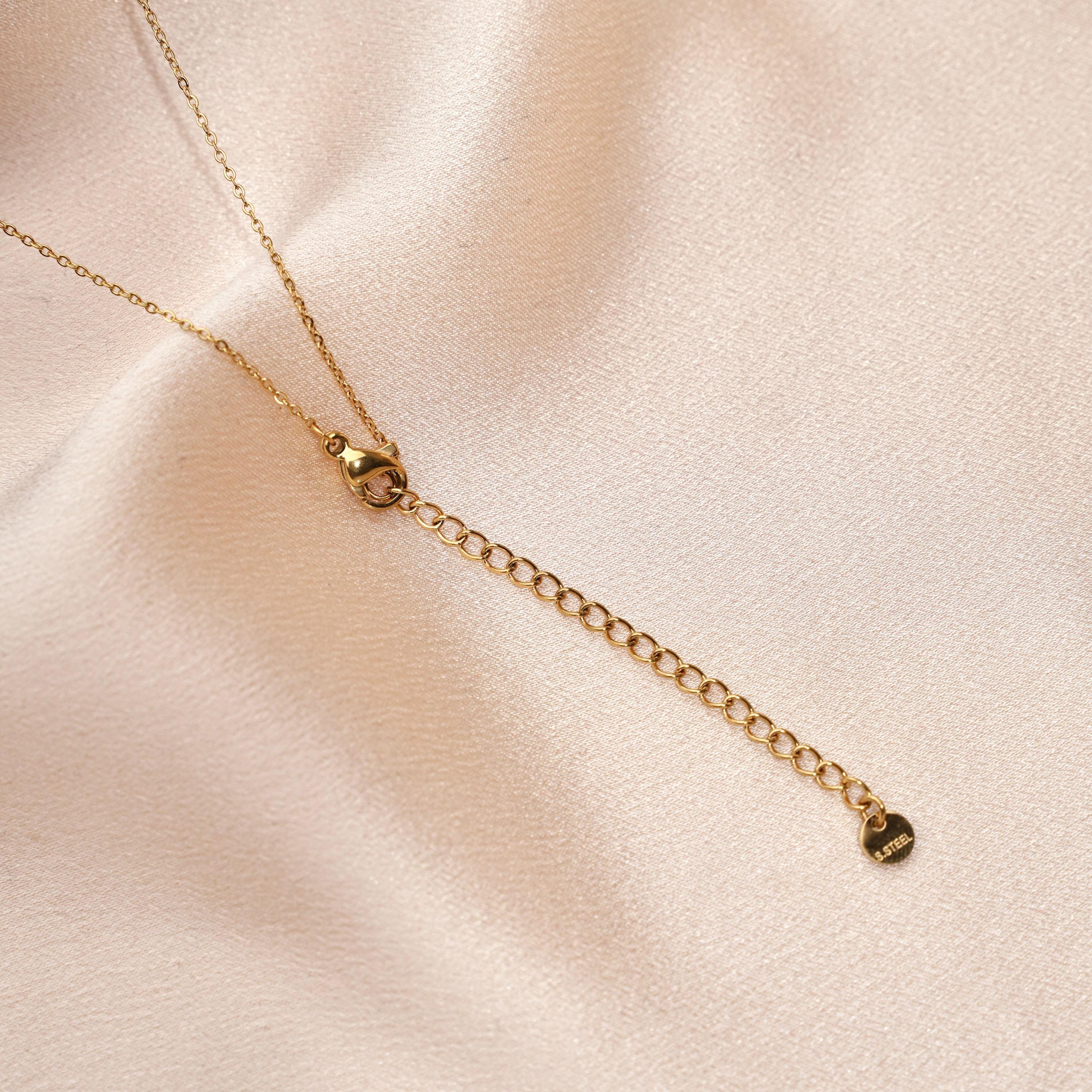 Collier ras de cou en acier inoxydable avec trois perles blanches / chocker