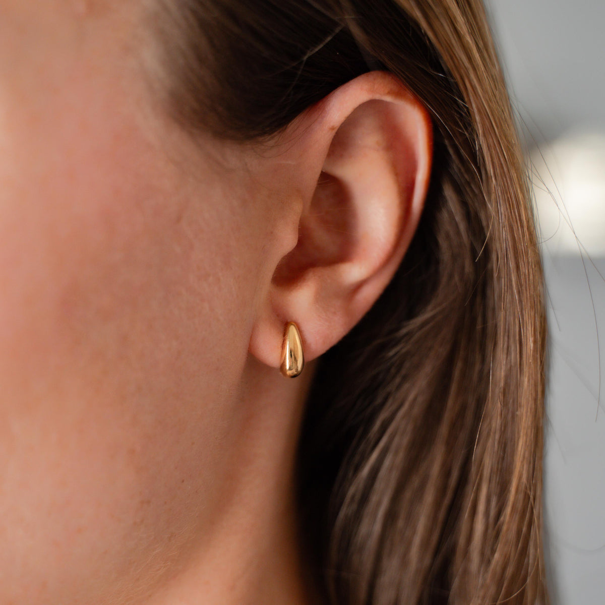 Boucles d'oreilles bombées dorées Ariane