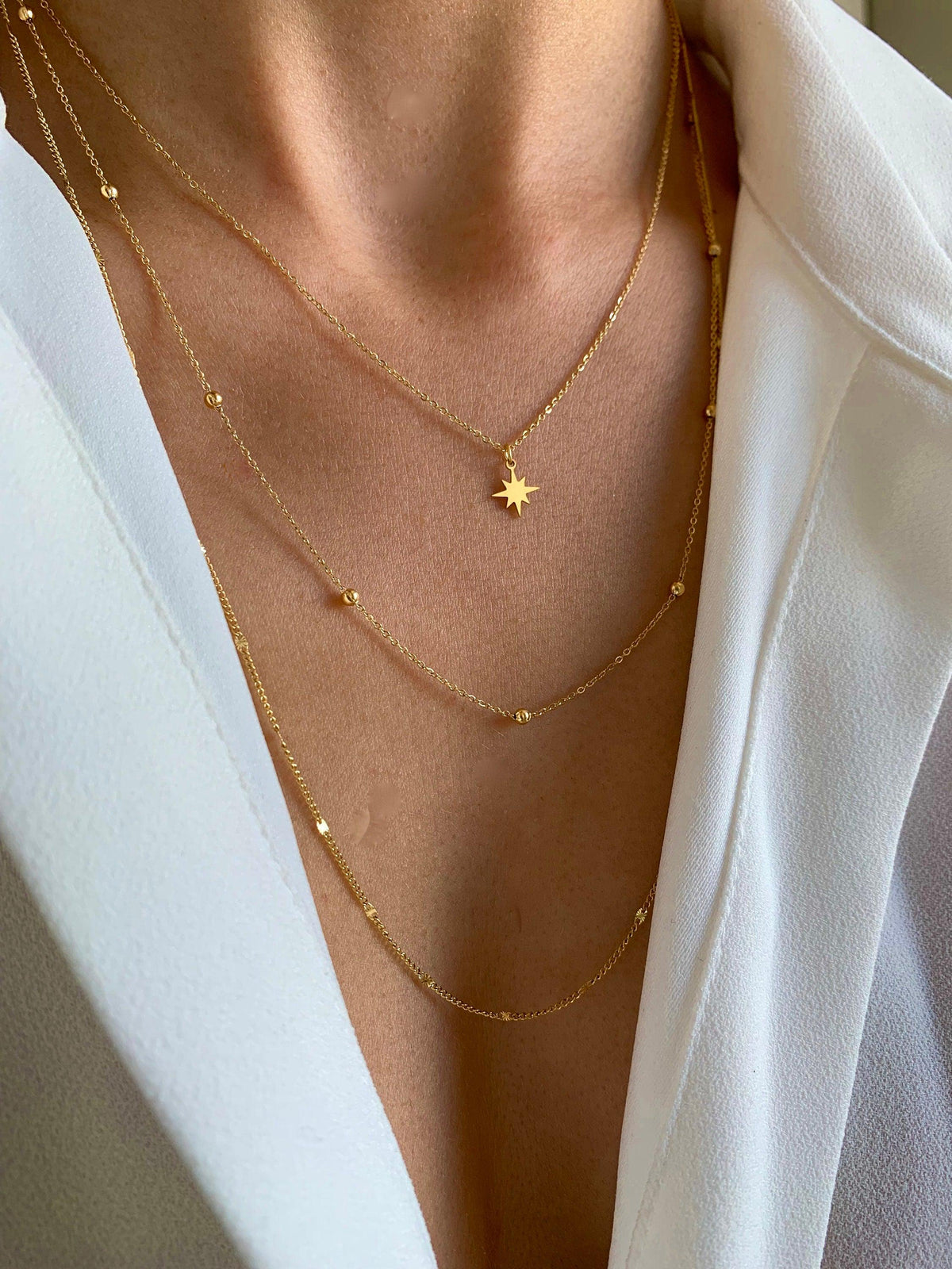 Collier pendentif étoile triple chaîne Éliane