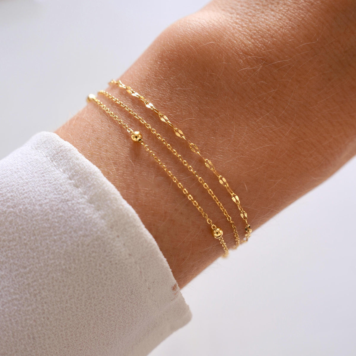 Bracelet femme triple chaîne dorée Pénélope