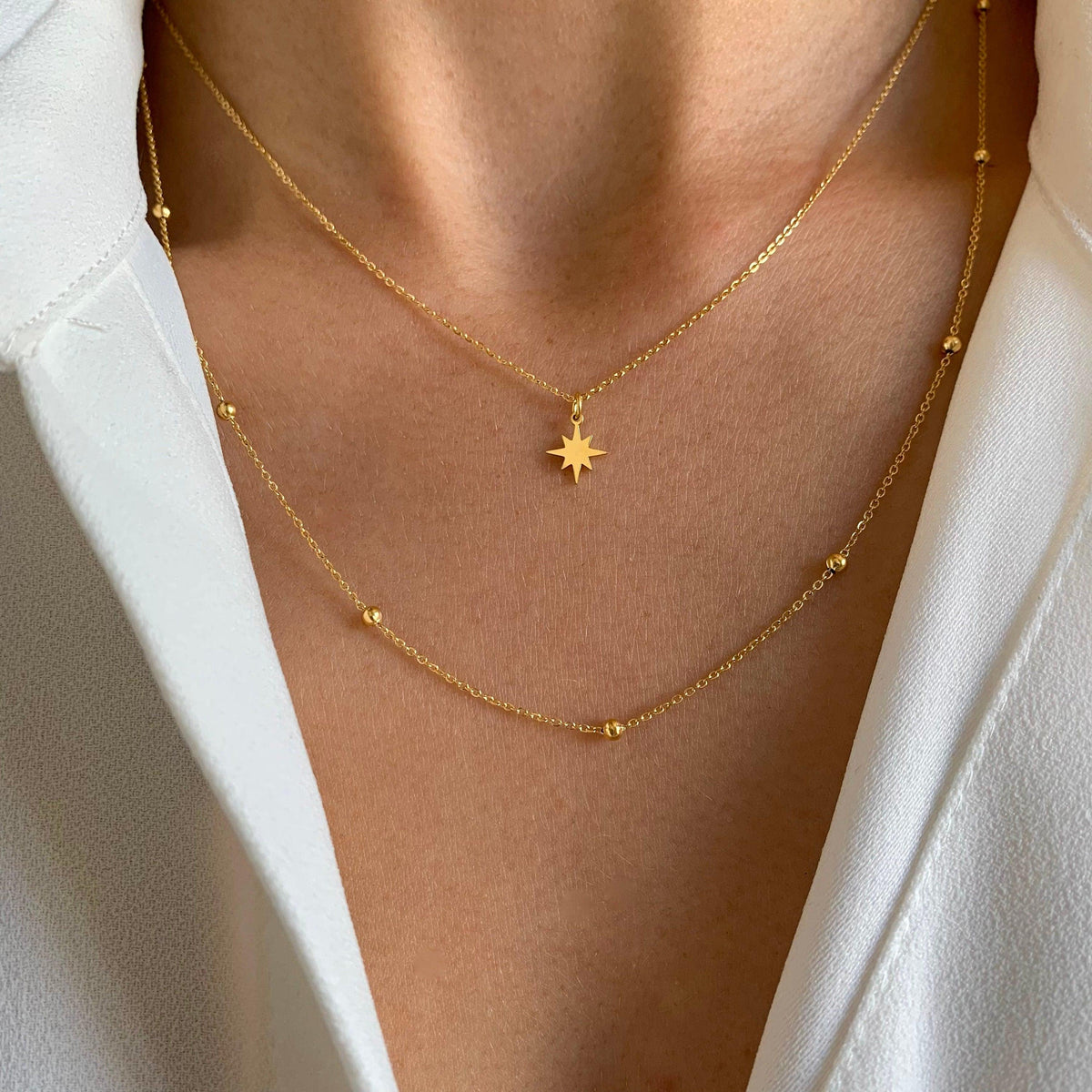 Collier double chaîne pendentif étoile Jacinthe