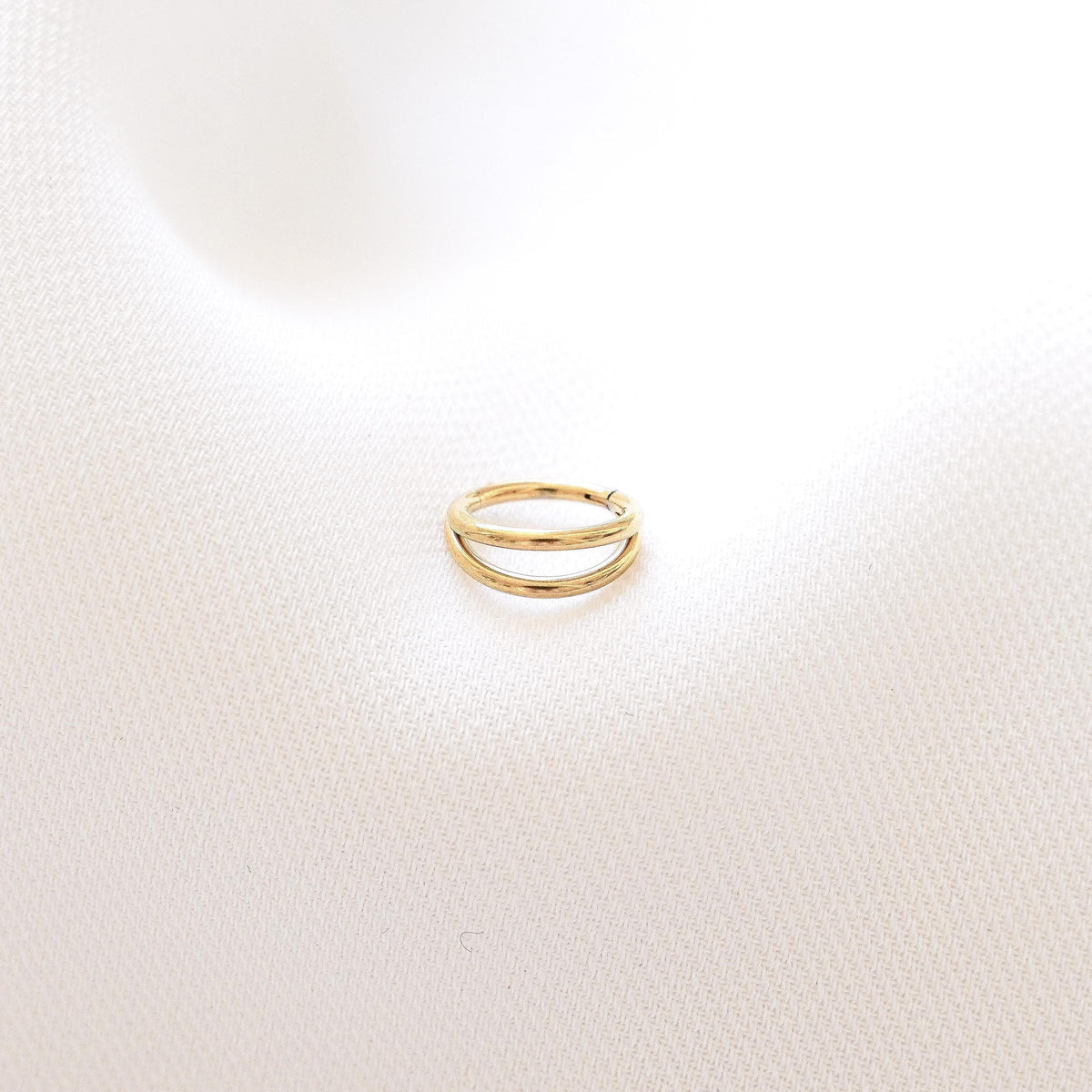 Piercing double anneau doré Solène