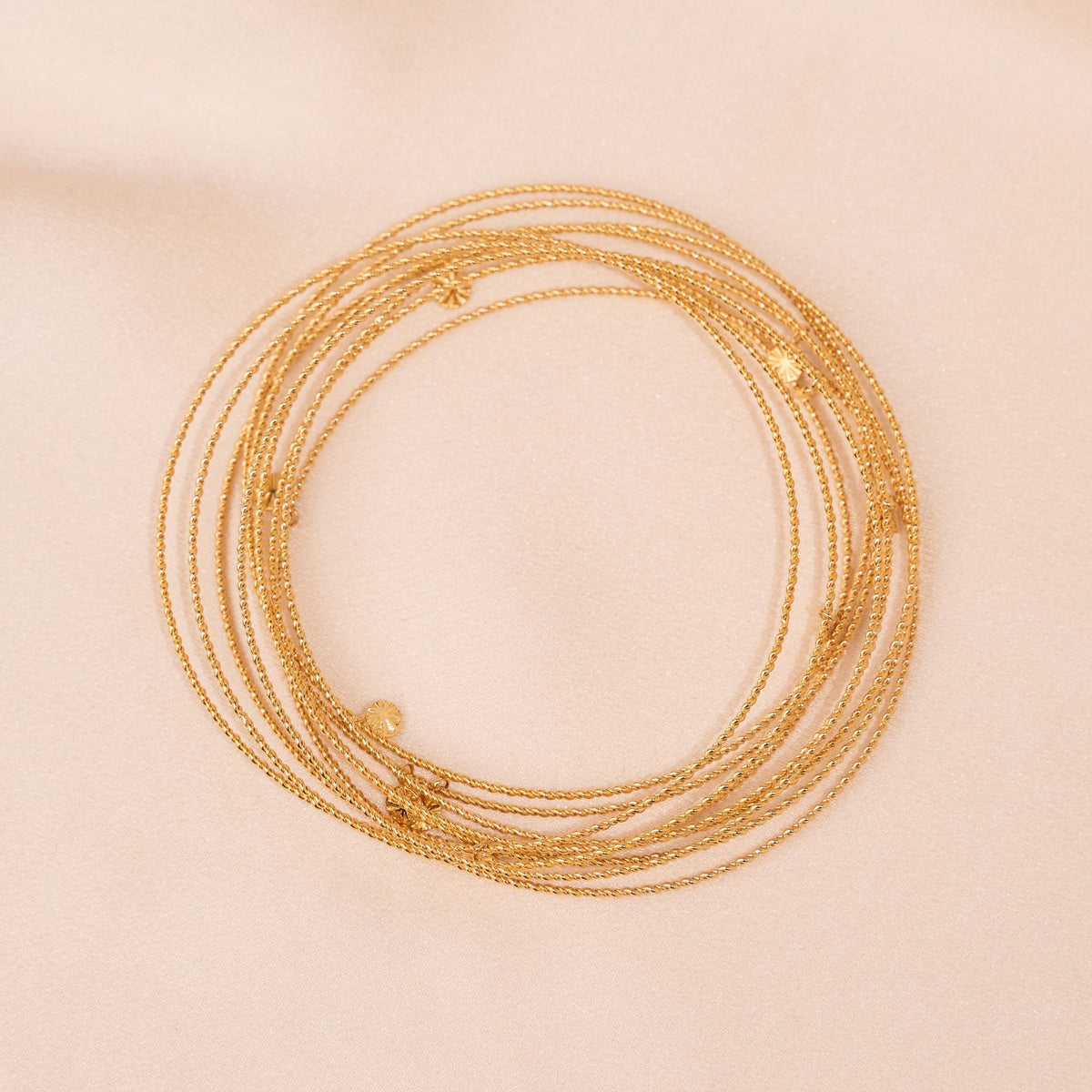 Jonc femme doré fins acier inoxydable Louvre photo 5